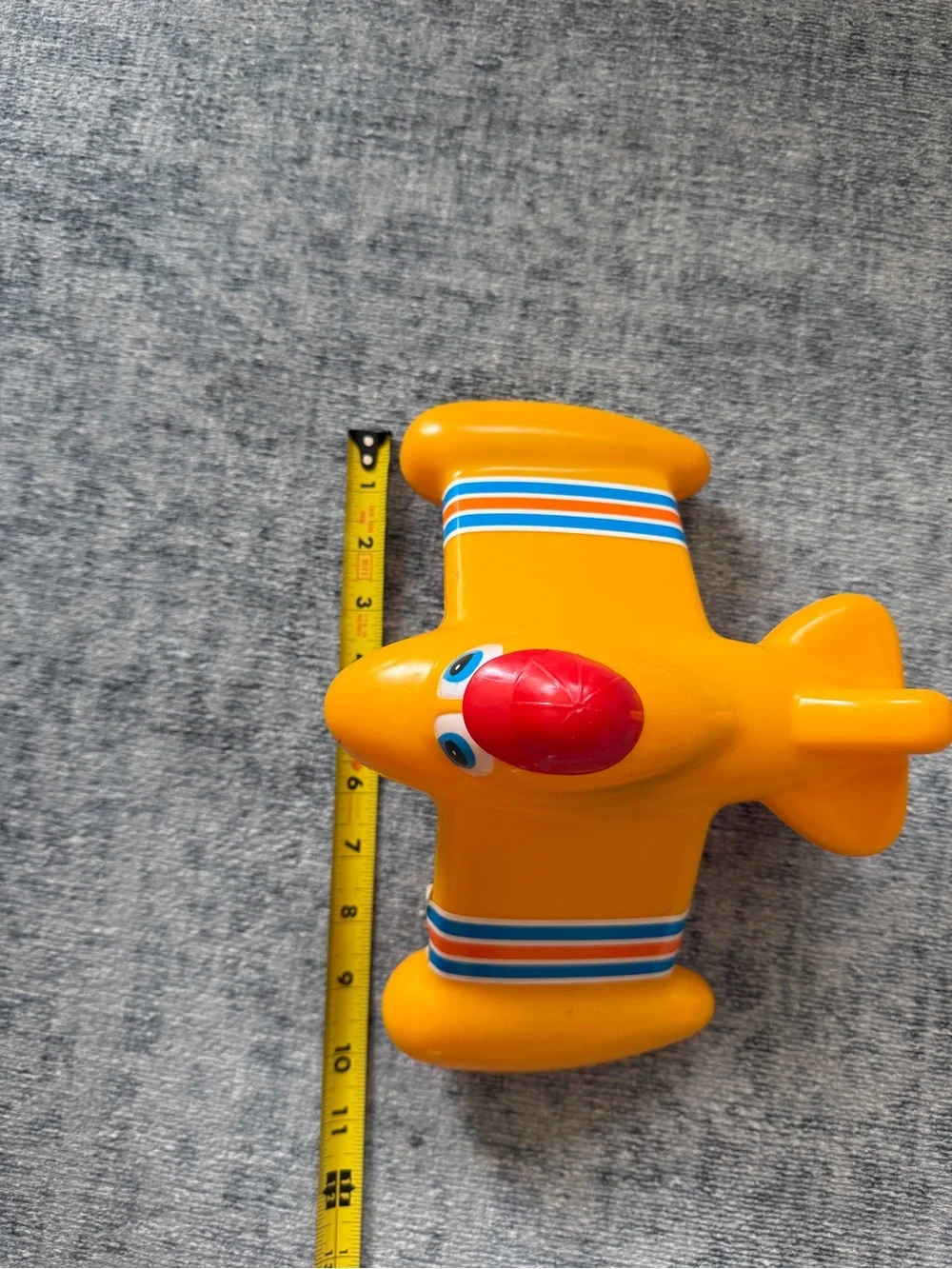 Vintage 1980s airplane toy- red hat and stripes on wings